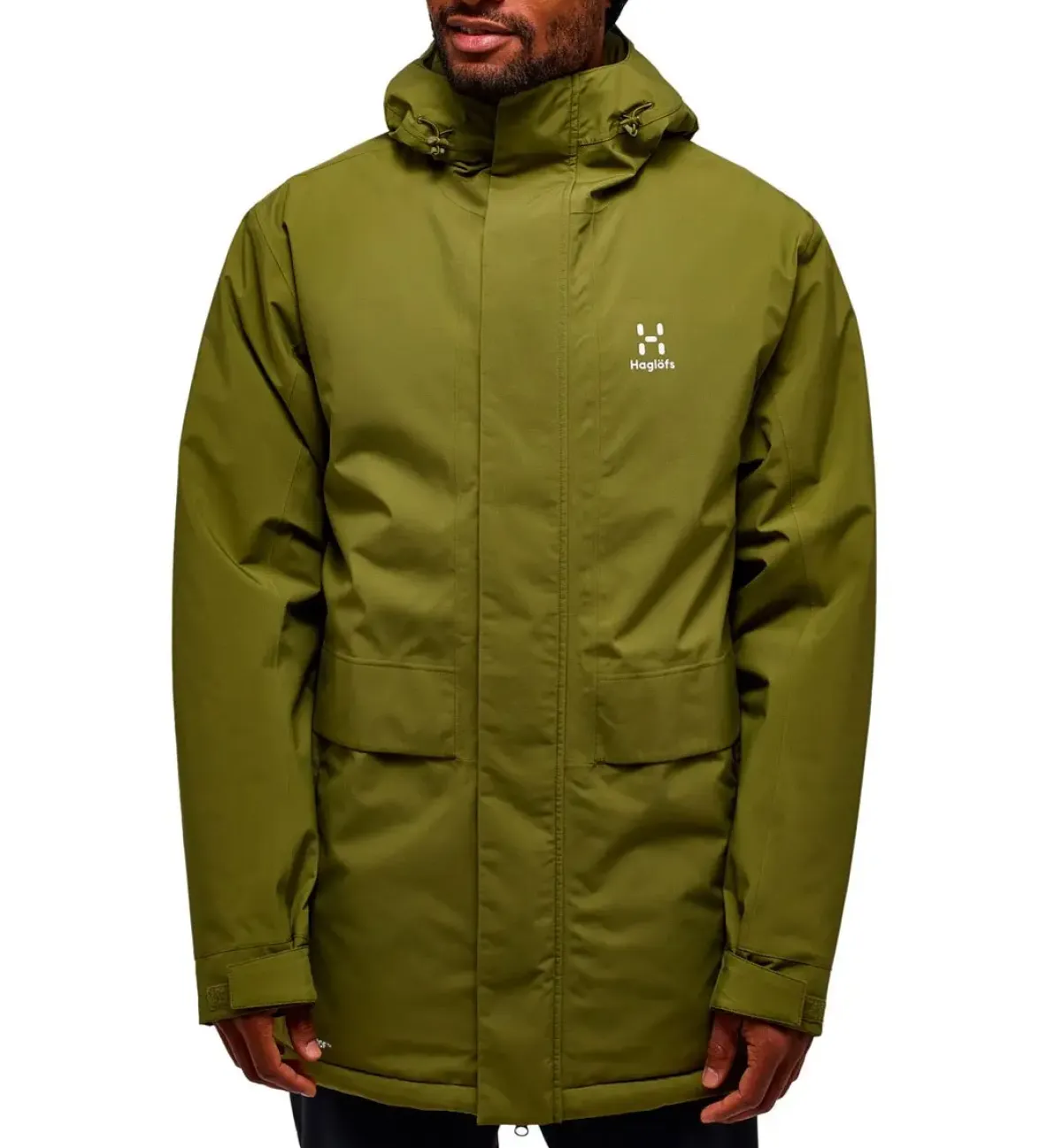 Haglöfs Vintertøj|Vintertøj-Salix Proof Mimic Parka Herre Oliven grønVægt: 954 gramMateriale: 100% genanvendt PROOF™ (Bluesign® -godkendt)Haglöfs Salix Proof Mimic Parka er en funktionel og bæredygtig vinterjakke, designet til at modstå selv de koldeste og mest våde vejrforhold. Parkaen er fremstillet med Haglöfs' PROOF™-teknologi, som gør jakken fuldt vandtæt og åndbar, så du kan forblive tør og komfortabel hele dagen.Jakken er foret med Mimic-materiale, der imiterer dun og giver en varm, letvægtsisolering – perfekt til kolde vinterdage. Den justerbare hætte, de praktiske lommer og de forstærkede skuldre giver ekstra funktionalitet og holdbarhed. Med et klassisk, stilfuldt design og bæredygtige materialer er Salix Proof Mimic Parka det ideelle valg til både byliv og friluftsliv, for dem der søger komfort og beskyttelse uden at gå på kompromis med miljøet.Detaljer:- 2 lags PROOF™ membran (Vind- og vandtæt)- Vandtæthed: vandsøjleværdi 10.000 mm- Åndbarhed: 10.000 g/m2/24 timer- Isoleret med Mimic SILVER pladeisolering - 2 forlommer og 1 indvendig lomme- Justerbar hætte- Justerbare ærmekanter- Reflekslogo ved lænden Detaljer